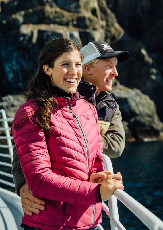 Couple laughing while on Kenai Fjords Tours cruise boat