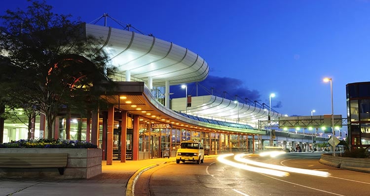 An airport pick-up and drop-off area.