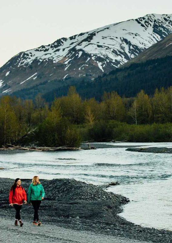 Image of women walking near frozen lake