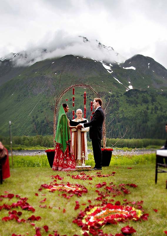 A couple getting married outdoors in Seward